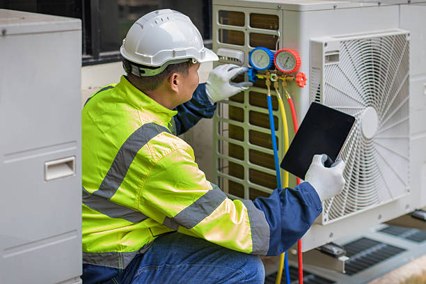 Professional Hvac technician working in Conover, OH